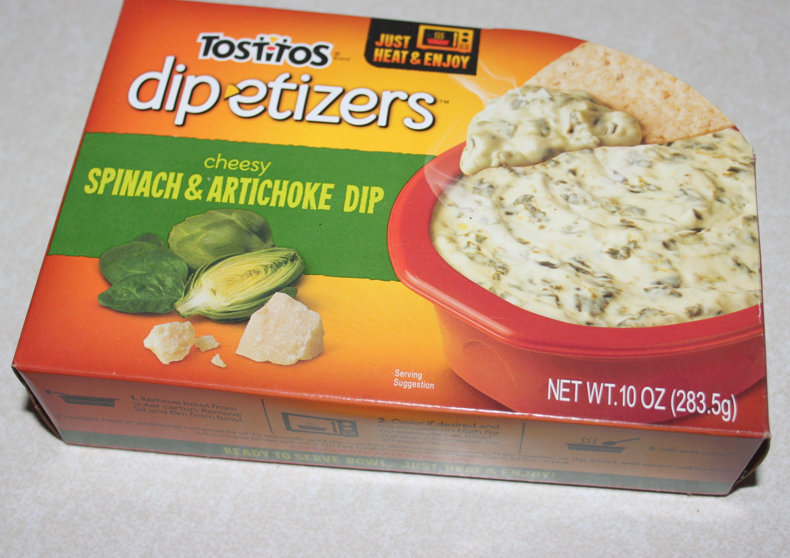 TOSTITOS® DIP-ETIZERS™ Cheesy Spinach & Artichoke Dip
